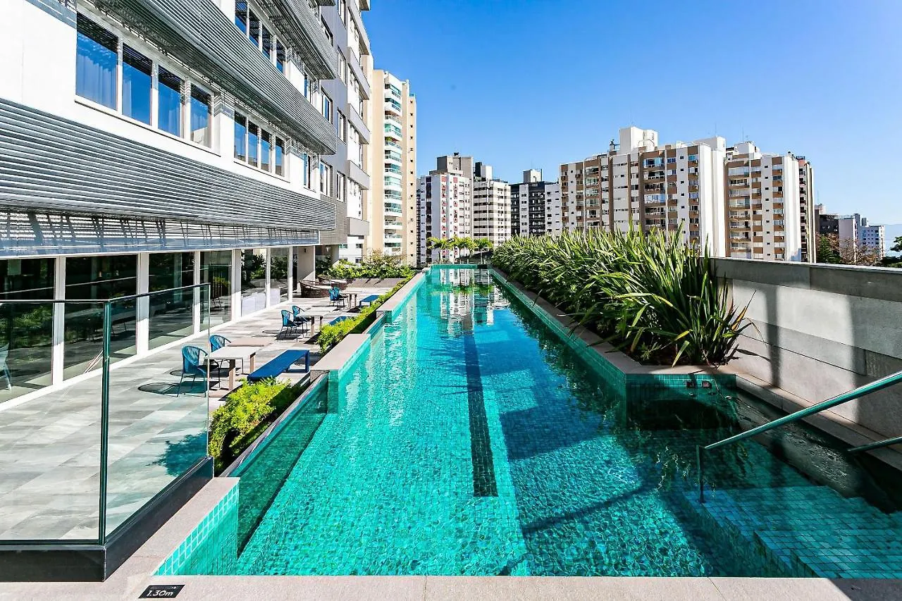 Apartamento Vista mar, confortável e aconchegante em condomínio com infraestrutura de clube CA25 Florianópolis Brasil